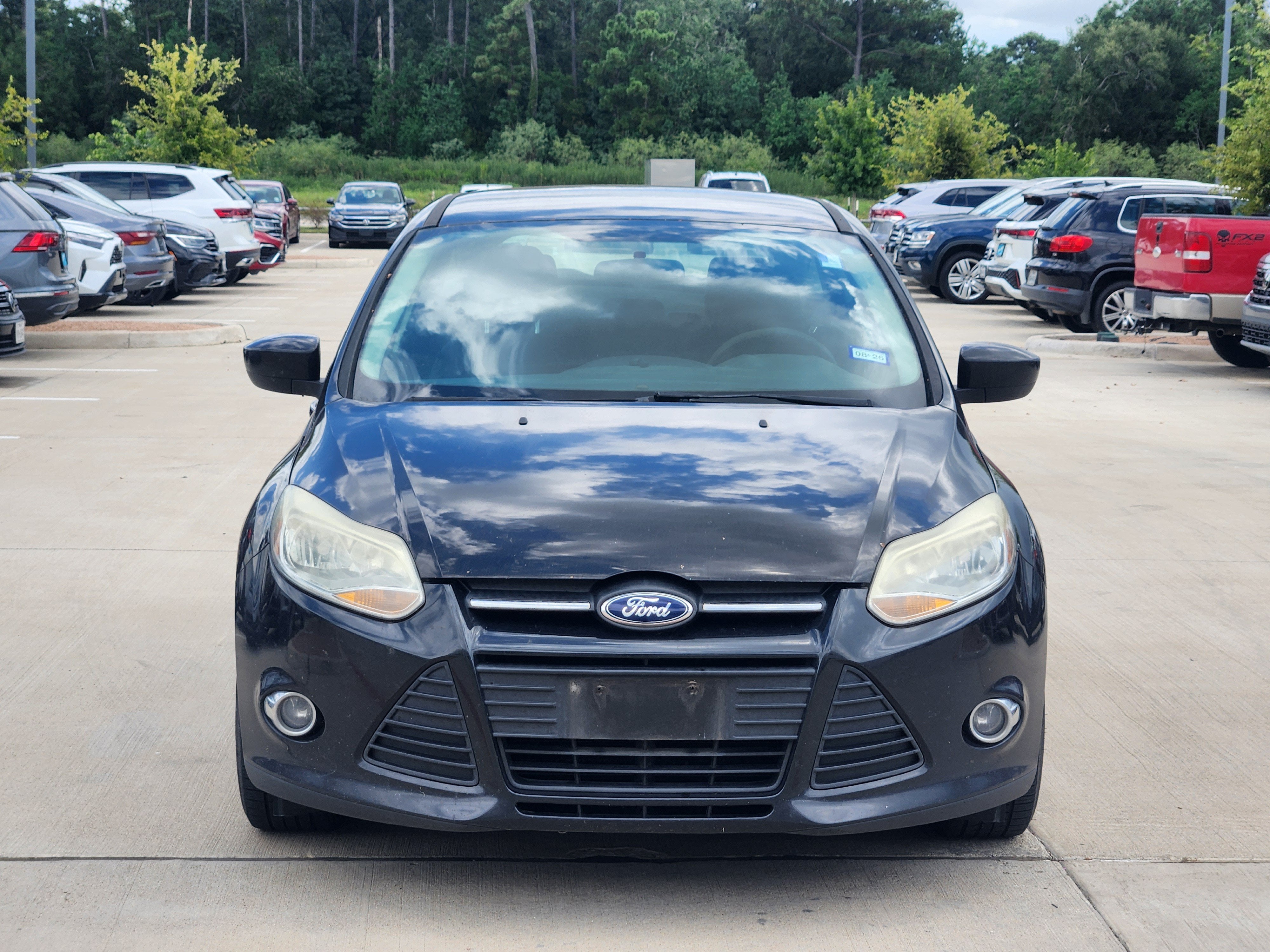 Used 2012 Ford Focus SE with VIN 1FAHP3K24CL465954 for sale in League City, TX