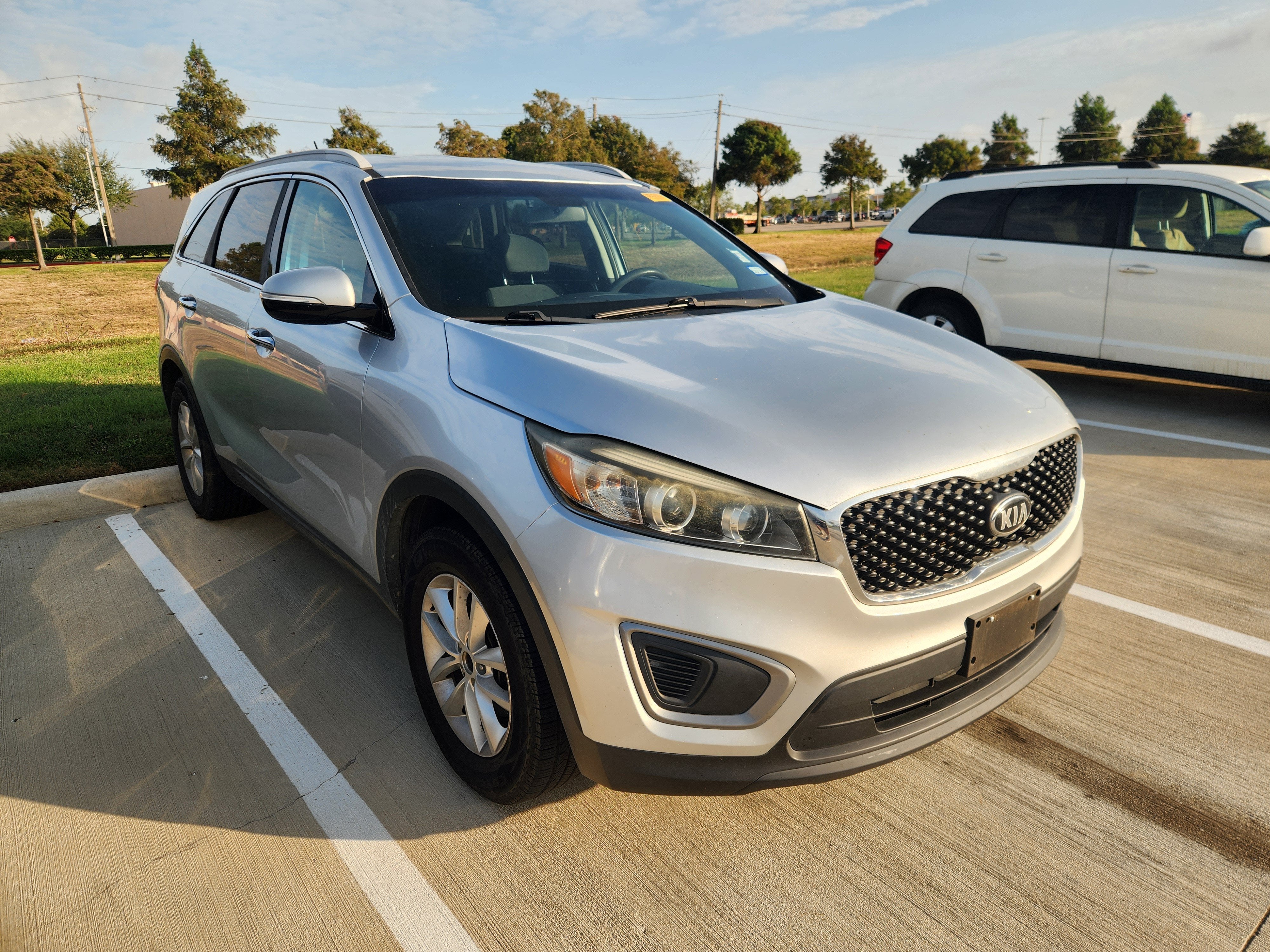 Used 2017 Kia Sorento LX with VIN 5XYPG4A30HG282303 for sale in League City, TX